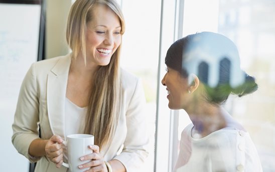 Two women laughing
